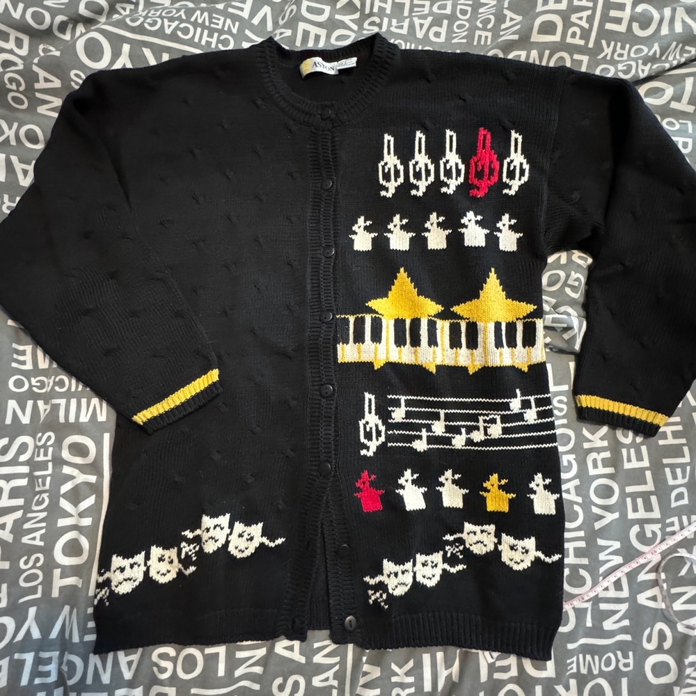 Woman’s gently worn vintage, rare music theme cotton sweater.